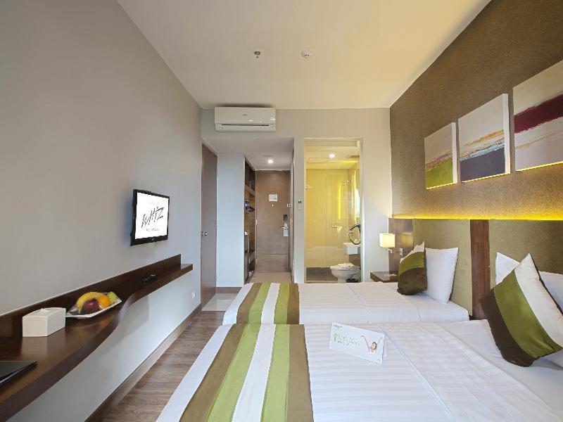 El Hotel Jakarta Szoba fotó